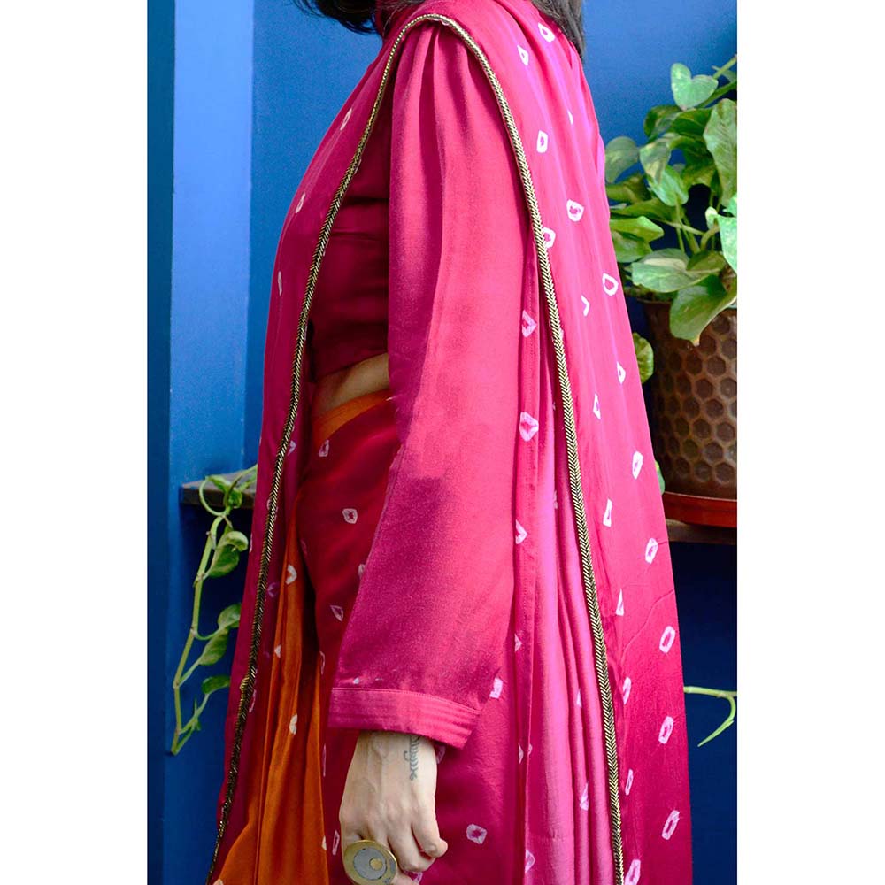 Aapro Label Orange Bandhej Saree With Stitched Blouse