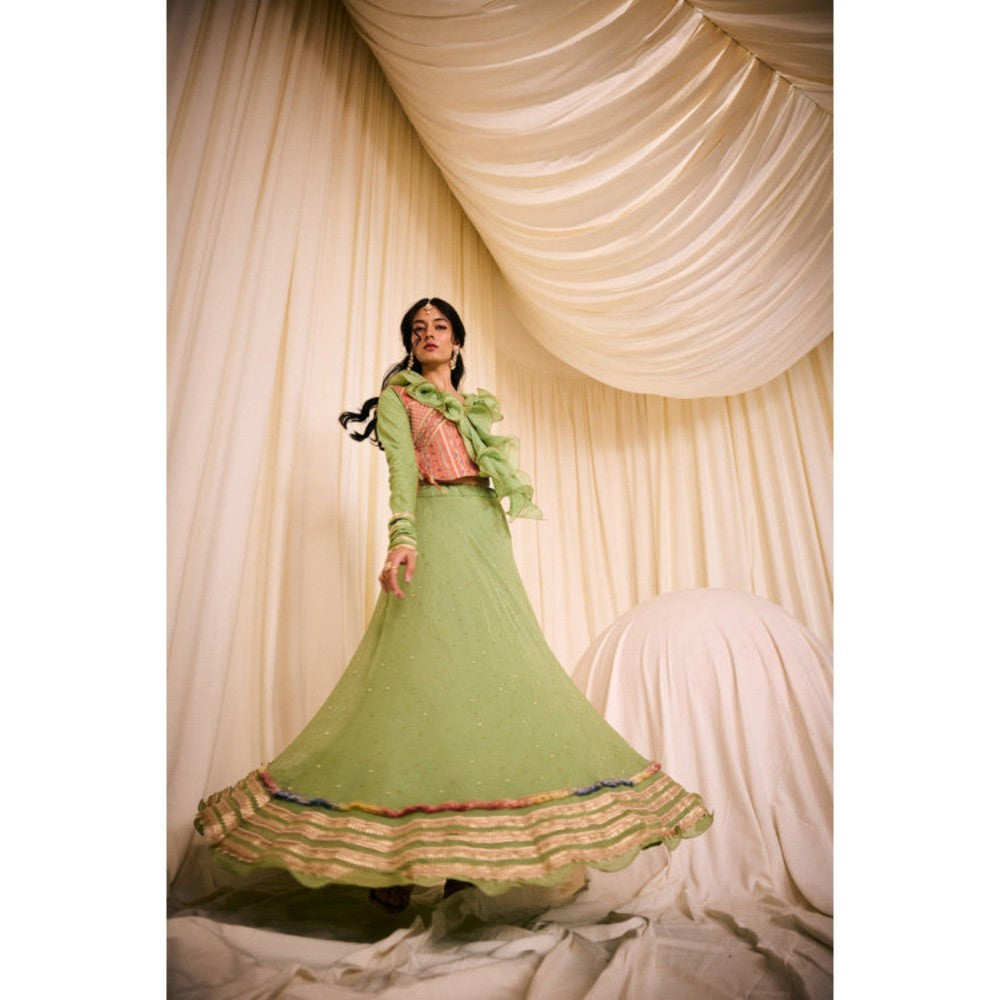 Leela by A Green Blouse With Ruffled Neck Along With Peach Bib And Fully Highlighted Lehenga