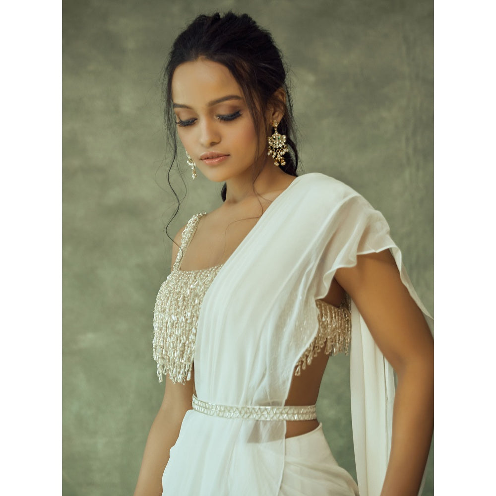 Pritika Vora Gold Tassel Blouse Paired with White Layered Saree & Belt with Stitched