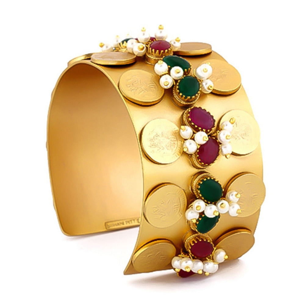 Suhani Pittie Gold coin hand cuff with red and green crystals and pearls