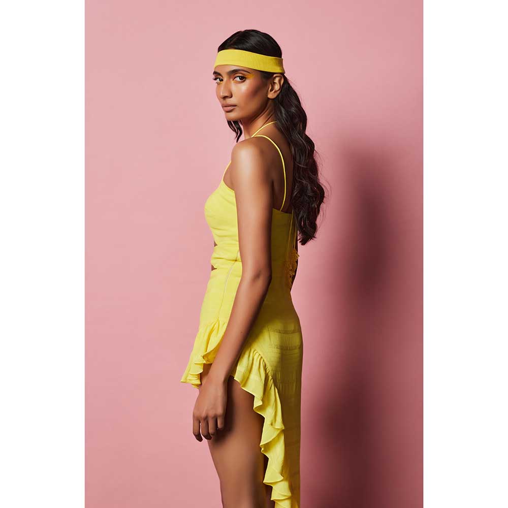 Nirmooha Lemon Yellow Cutout Asymmetrical Dress with attached Hand Embroidered Tassels