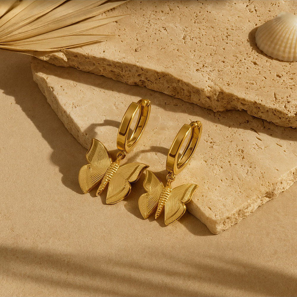 ANUSHKA JAIN JEWELLERY Gold Butterfly Stud Earrings