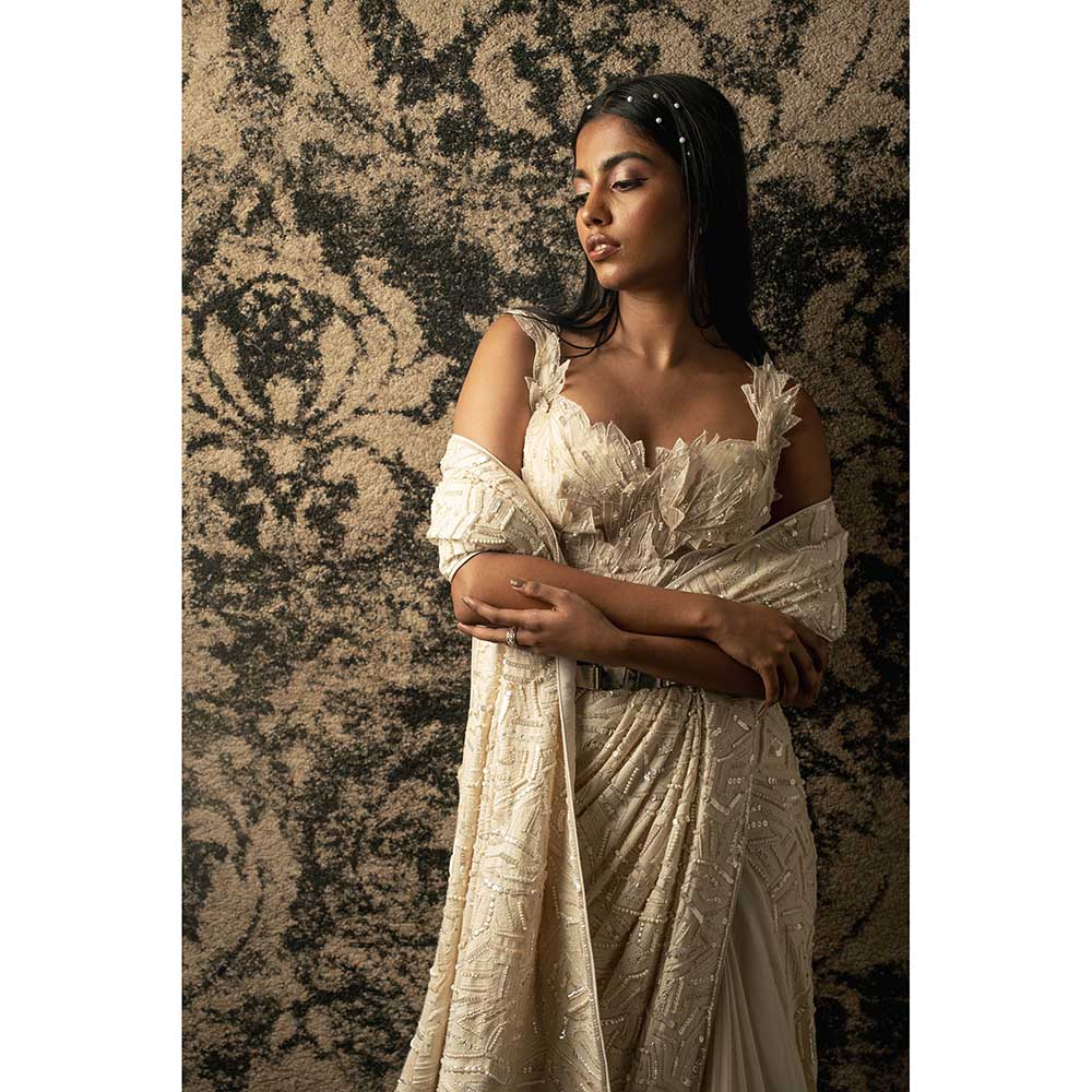 Jigar and Nikita Ivory Silk Saree With Stitched Blouse And Petticoat