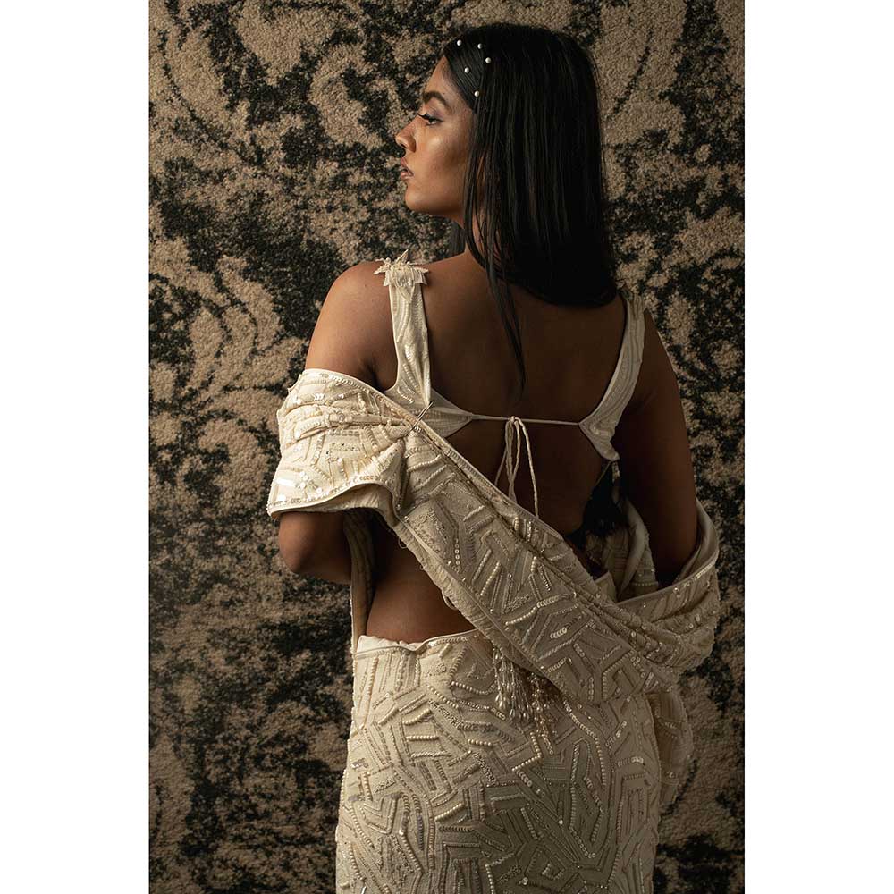 Jigar and Nikita Ivory Silk Saree With Stitched Blouse And Petticoat