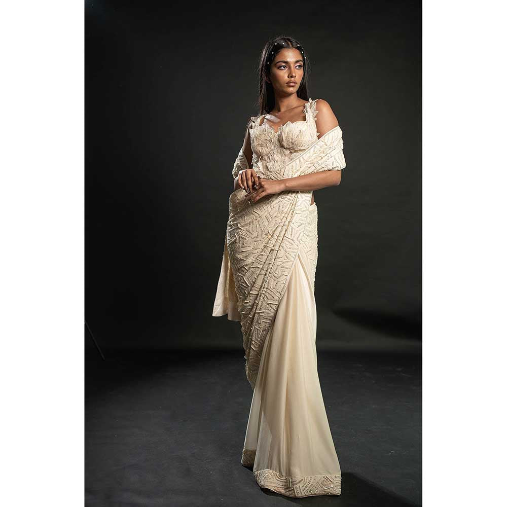 Jigar and Nikita Ivory Silk Saree With Stitched Blouse And Petticoat