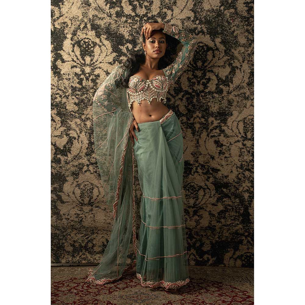 Jigar and Nikita Turquoise Saree With Stitched Blouse And Petticoat