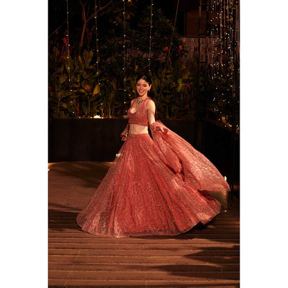 Jigar and Nikita Coral Rose Dust Drape Attached Blouse with Lehenga (Set of 2)