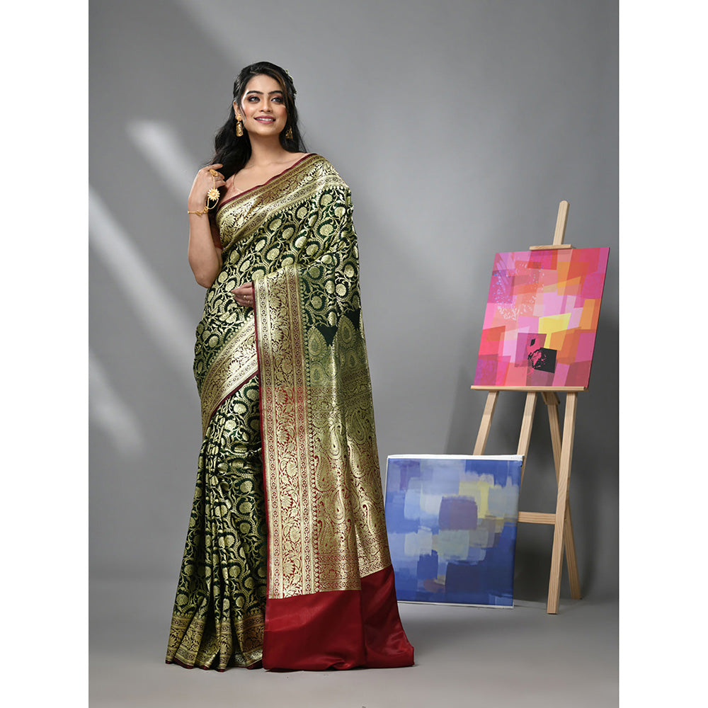 CHARUKRITI Dark Green Silk Banarasi Saree with Zari Woven Designs & Unstitched Blouse