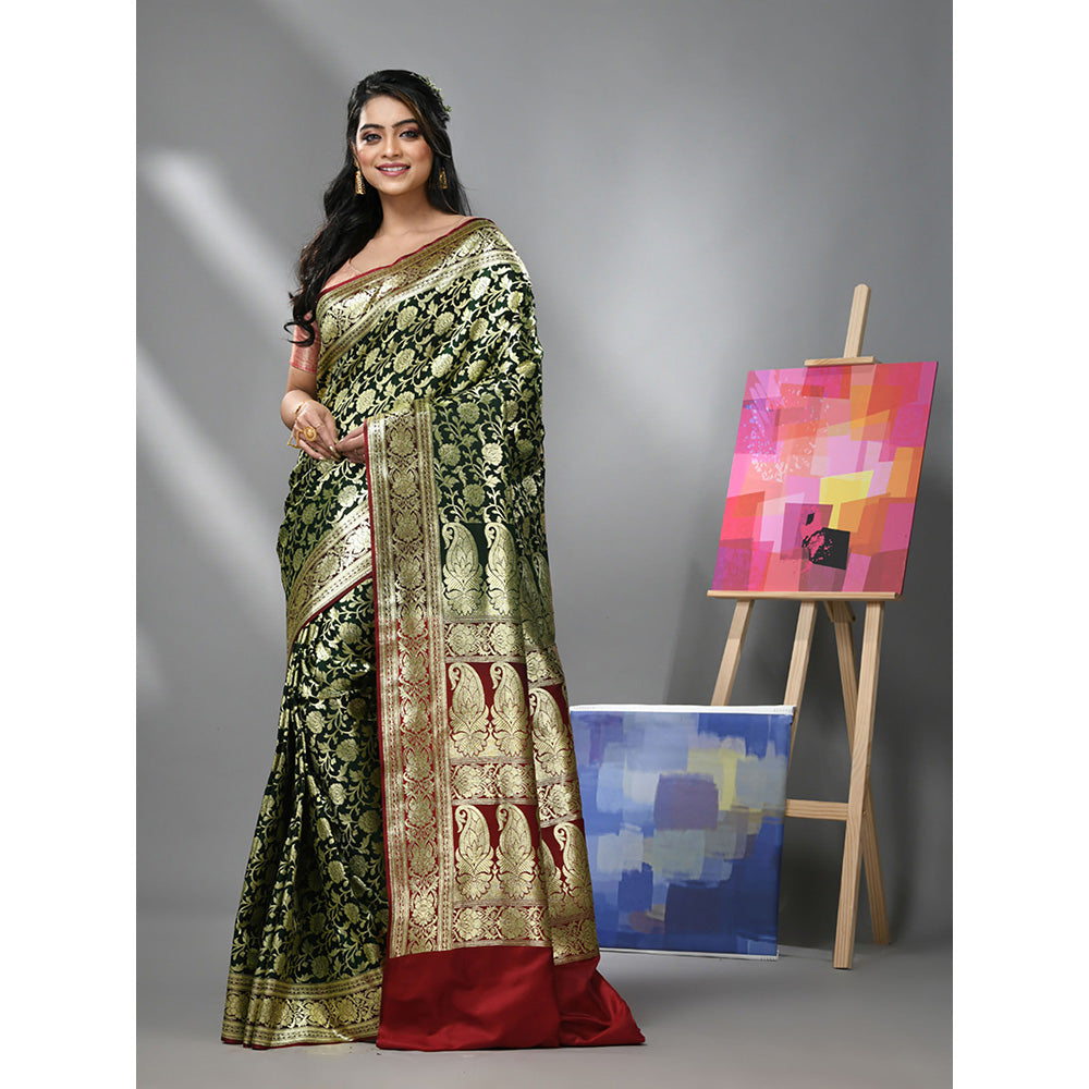 CHARUKRITI Dark Green Silk Banarasi Saree with Zari Woven Designs & Unstitched Blouse