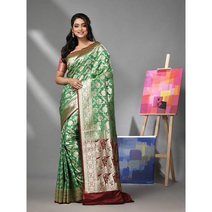 CHARUKRITI Green Silk Banarasi Saree with Zari Woven Designs & Unstitched Blouse