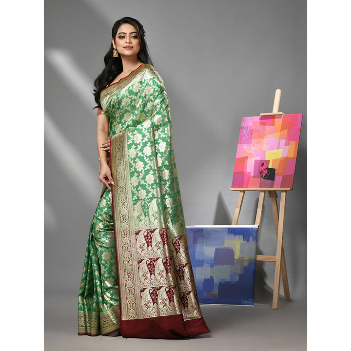 CHARUKRITI Green Silk Banarasi Saree with Zari Woven Designs & Unstitched Blouse