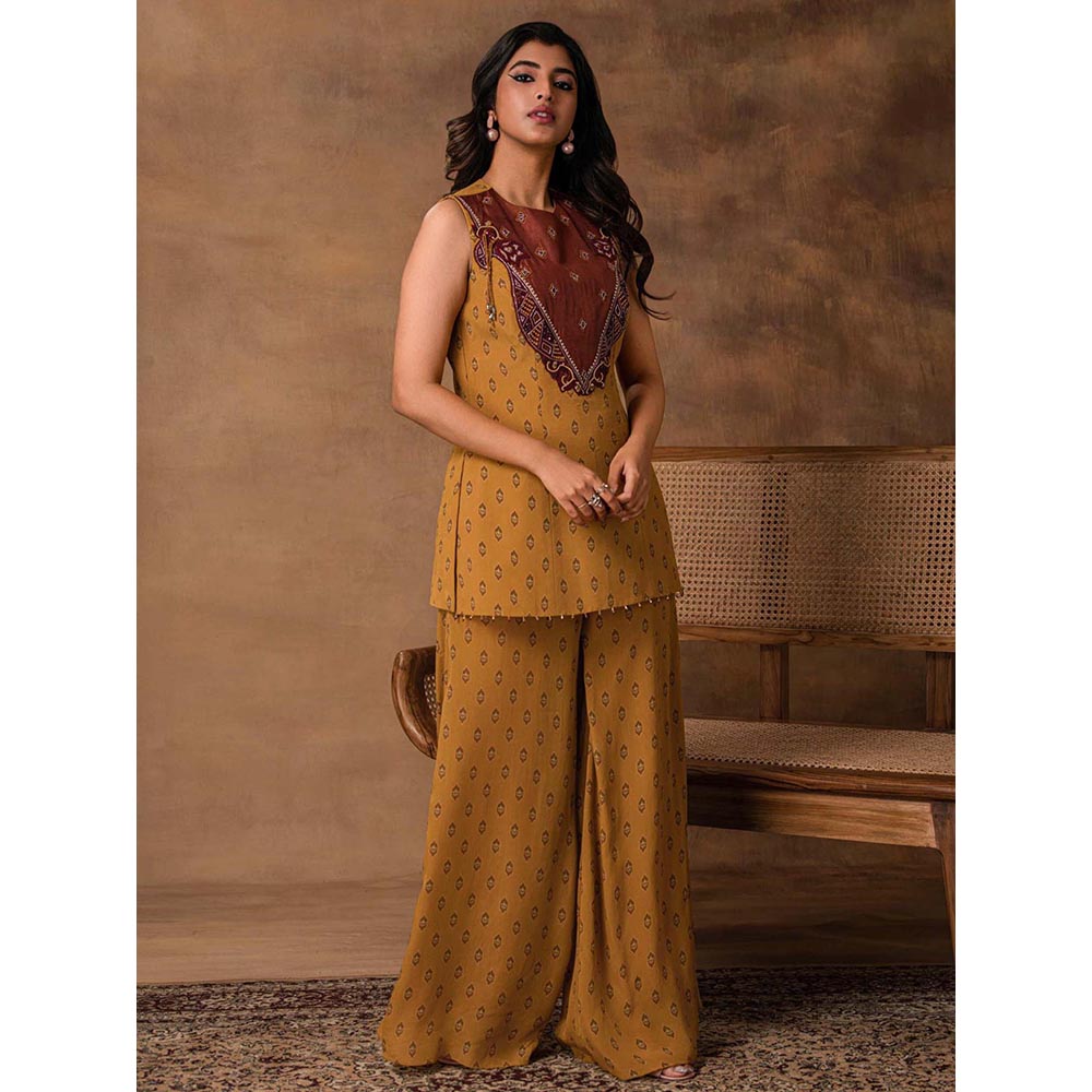ISHA GUPTA TAYAL Taraab Mustard Gold Crepe Peplum Top and Pant Set