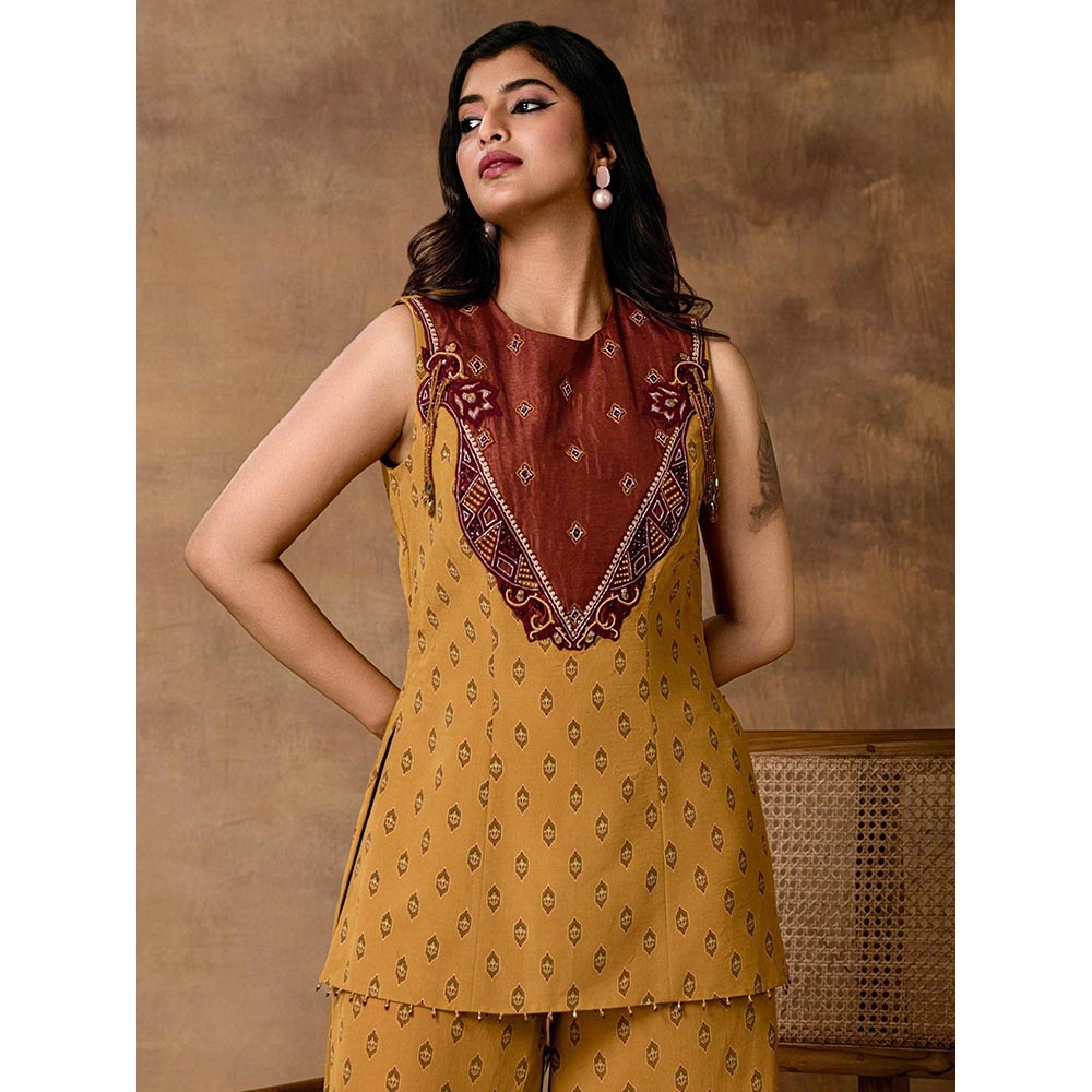 ISHA GUPTA TAYAL Taraab Mustard Gold Crepe Peplum Top and Pant Set