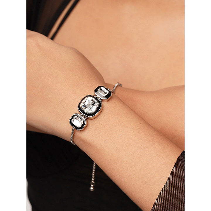 Isharya Bougie Crystal Bezel Bracelet In Rhodium Plated