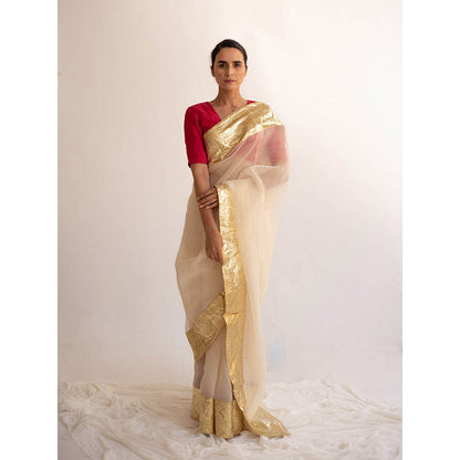 KAPARDARA A Pure Silk Organza Saree In The Shade Of Cream Handcrafted With Gold Lampe Border