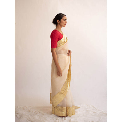 KAPARDARA A Pure Silk Organza Saree In The Shade Of Cream Handcrafted With Gold Lampe Border