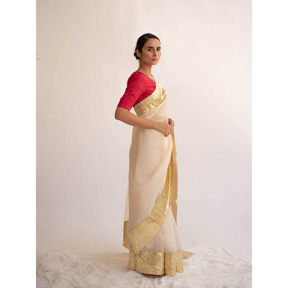 KAPARDARA A Pure Silk Organza Saree In The Shade Of Cream Handcrafted With Gold Lampe Border