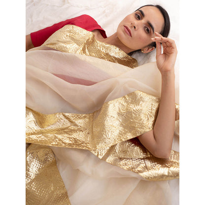 KAPARDARA A Pure Silk Organza Saree In The Shade Of Cream Handcrafted With Gold Lampe Border