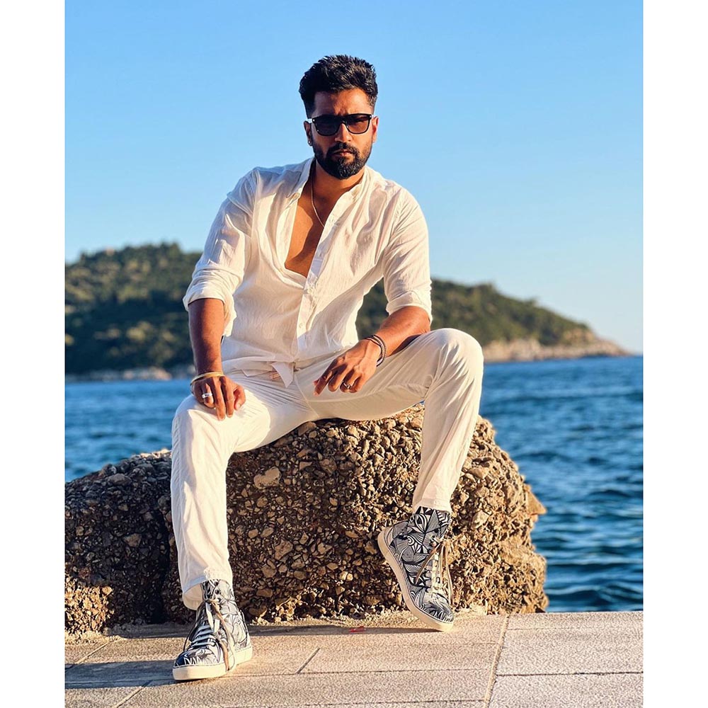 Kavith Sainaani Printed Eye Bow Sneakers