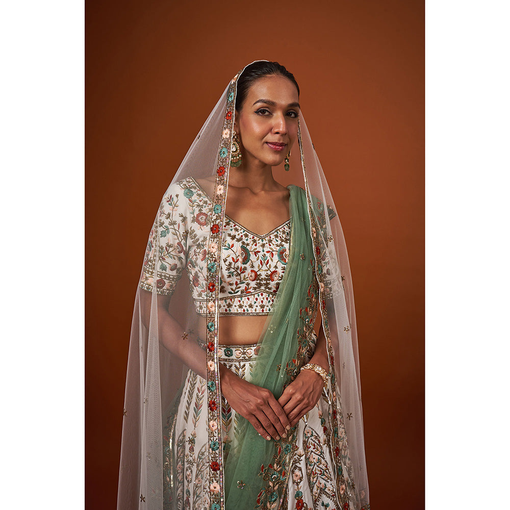 MEHAK MURPANA Ivory Embroidered Lehenga with Stitched Blouse And 2 Dupatta (Set of 4)