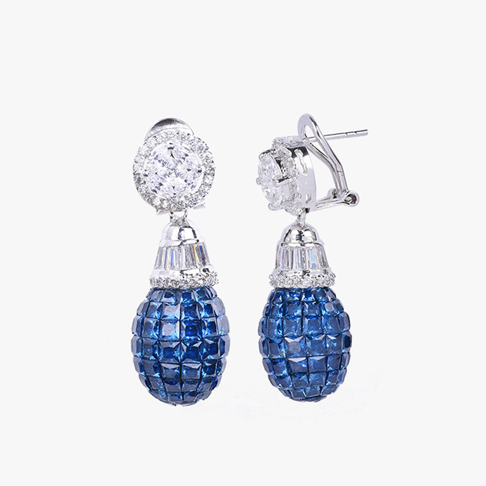 Mon Tresor Fused Solitaire Top With Blue Sapphire Drop Earrings In An Invisible Setting