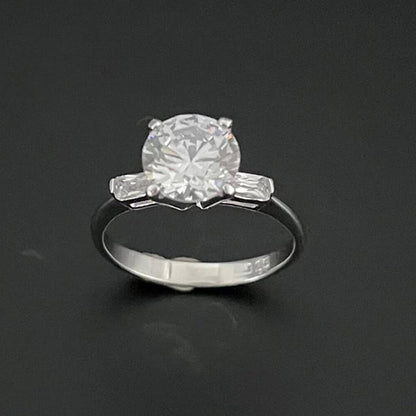 Mon Tresor White 2 Carat Solitaire Flanked By Baguette Diamonds With Plain Band Ring