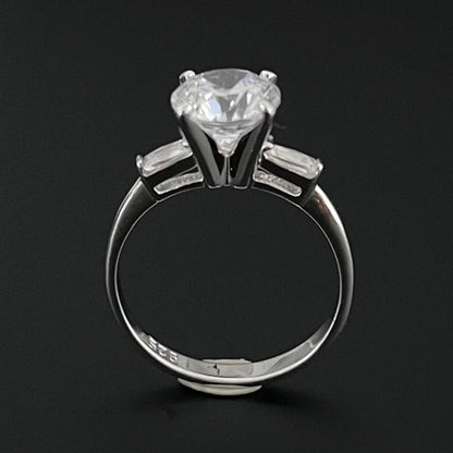 Mon Tresor White 2 Carat Solitaire Flanked By Baguette Diamonds With Plain Band Ring
