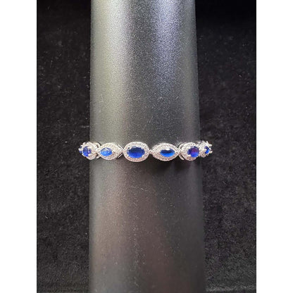 Mon Tresor Oval And Marquis Blue With Halo