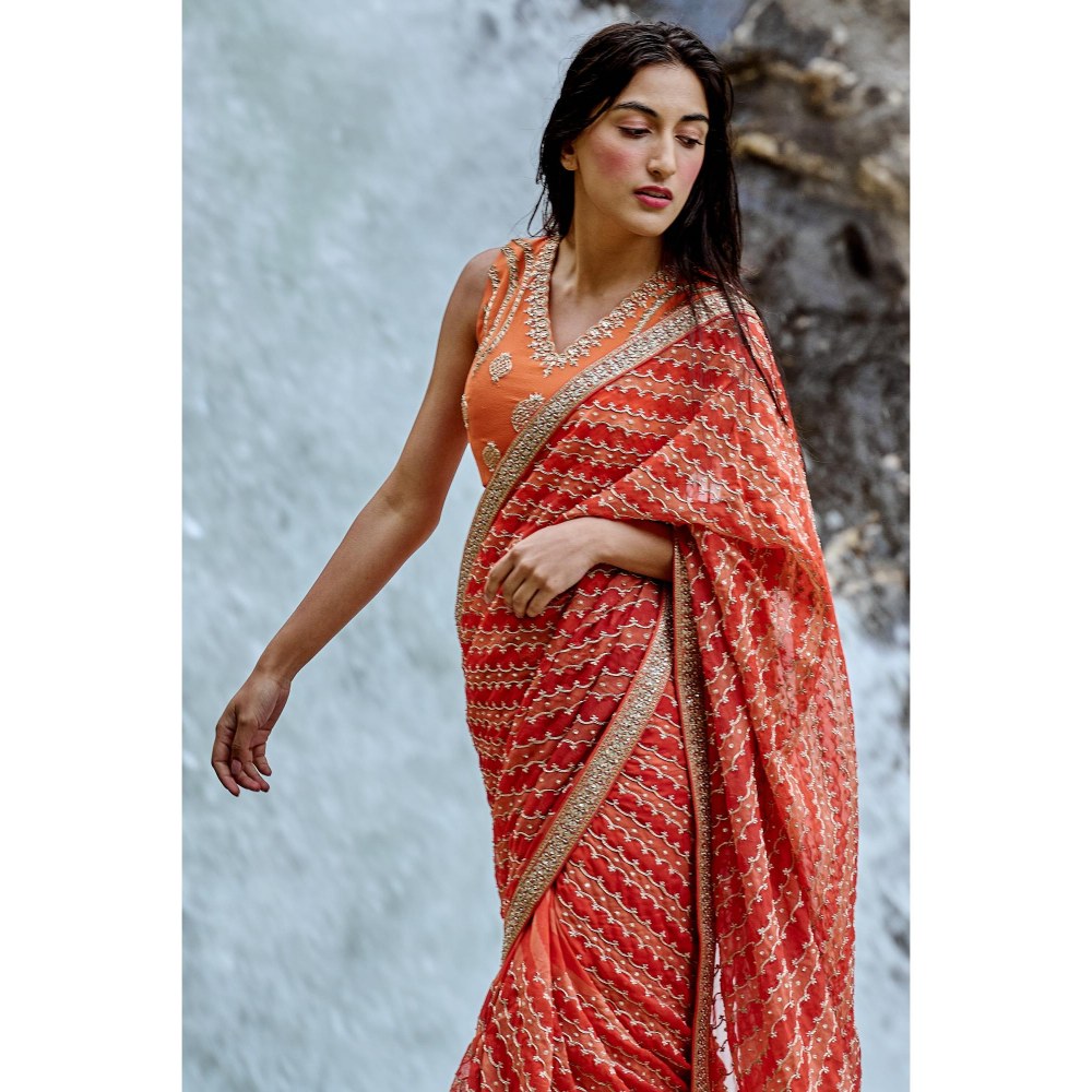 Paulmi & Harsh Narcissa Orange Saree with Stitched Blouse and Petticoat