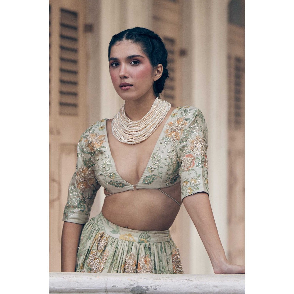 Paulmi & Harsh Nellie Ivory Lehenga with Choli and Dupatta