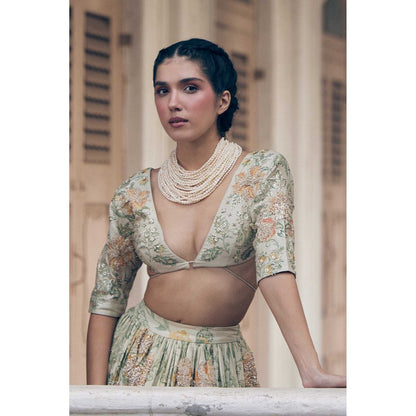 Paulmi & Harsh Nellie Ivory Lehenga with Choli and Dupatta