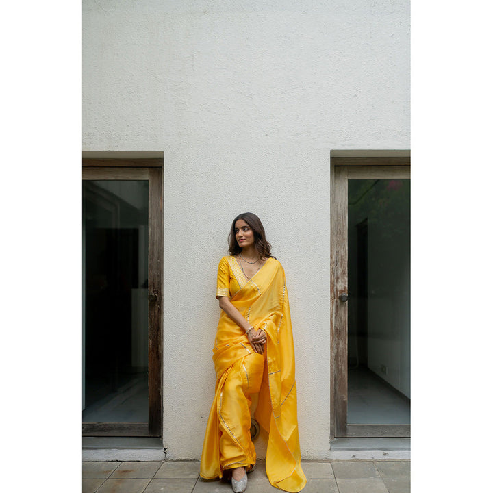 PEELI DORI Madhubala Yellow Solid Gota Work Saree with Stitched Blouse