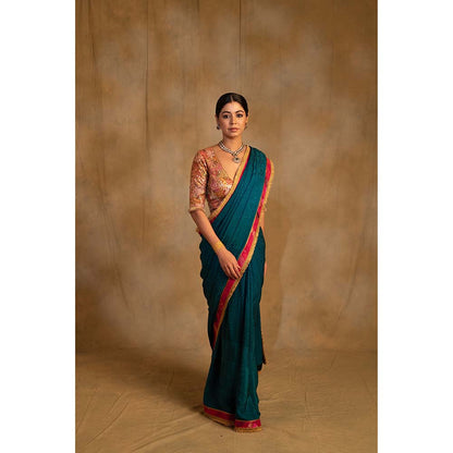 PRIYANKA RAAJIV Holi Teal Self Design Silk Crepe Saree with Unstitched Blouse