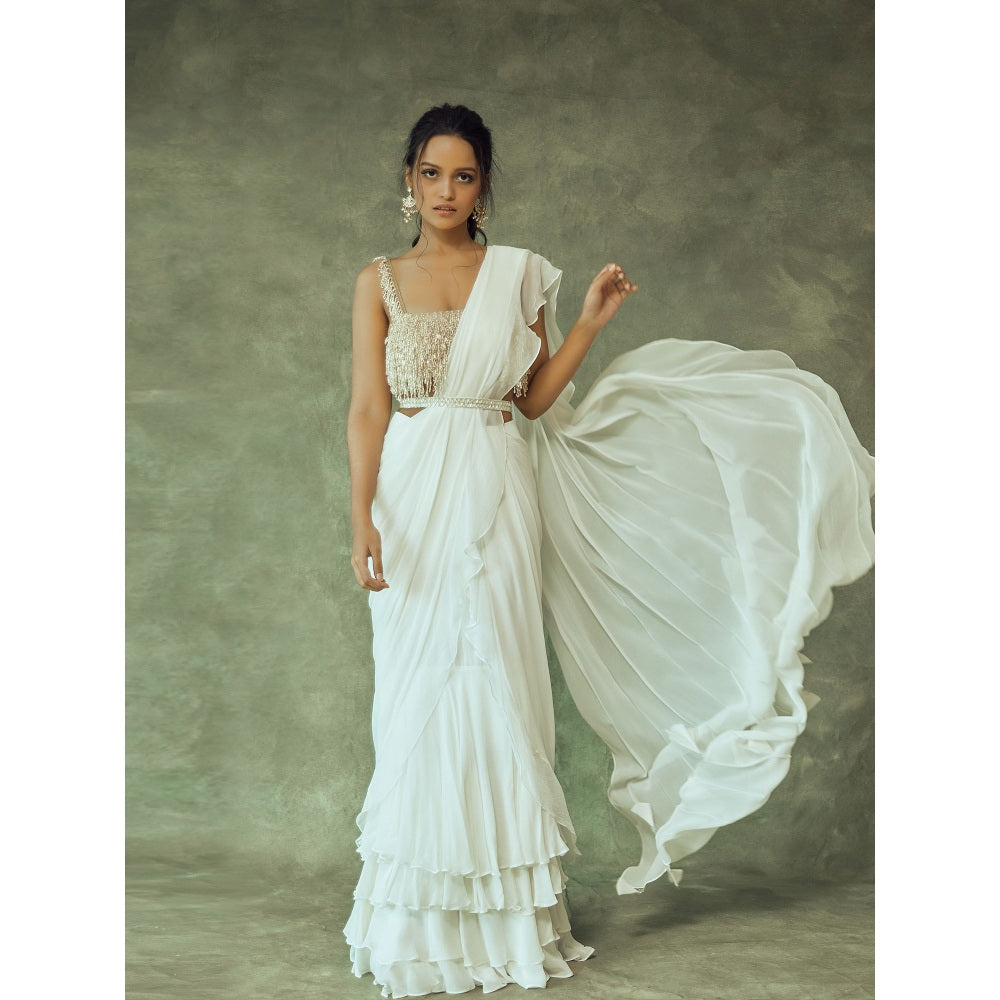 Pritika Vora Gold Tassel Blouse Paired with White Layered Saree & Belt with Stitched