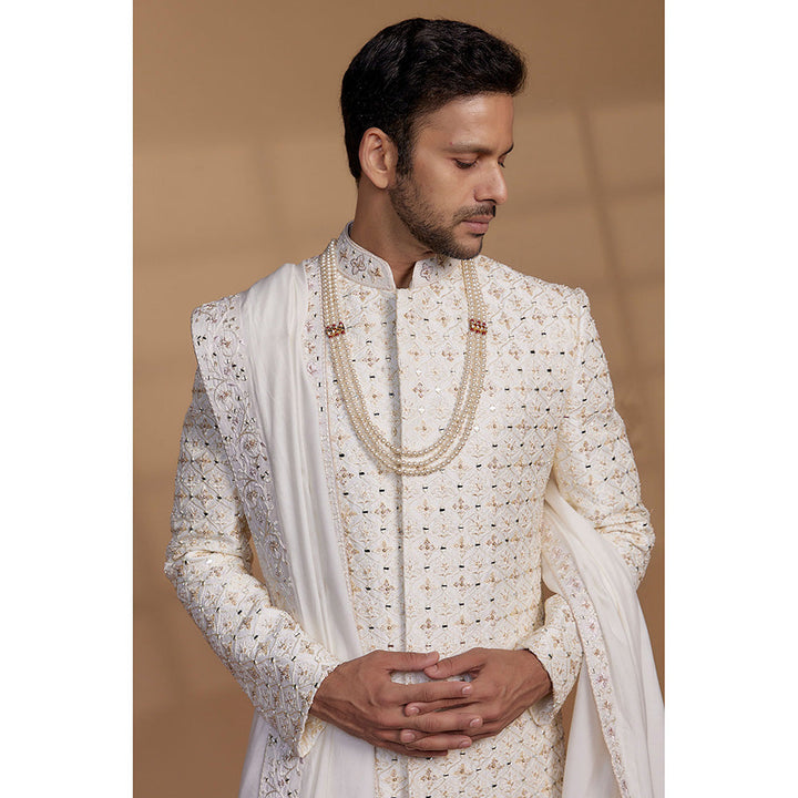 RIYAASAT Ivory Raw Silk Sequin Embellished Sherwani with Churidar and Shawl (Set of 3)