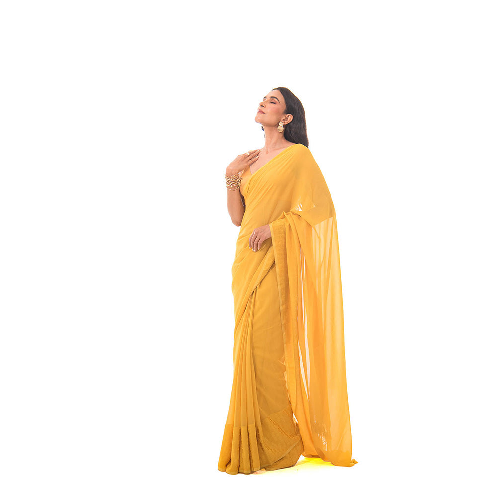 Sacred Weaves Mustard Plain Saree with Unstitched Blouse