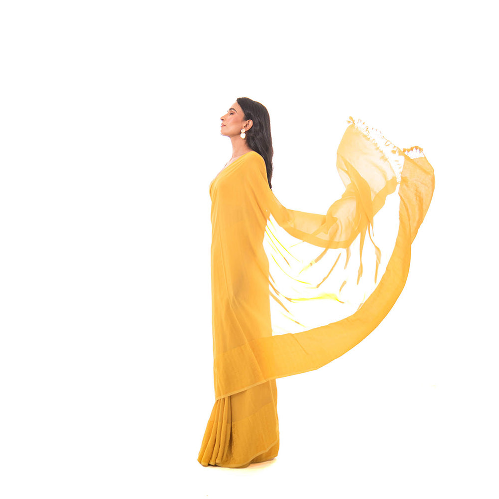 Sacred Weaves Mustard Plain Saree with Unstitched Blouse