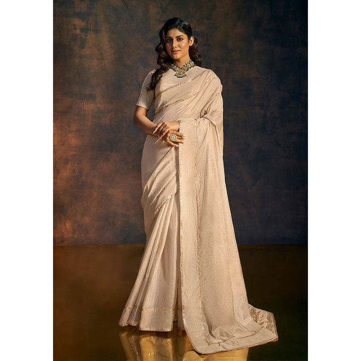 SALWAR STUDIO Beige Embellished Tissue Saree without Blouse