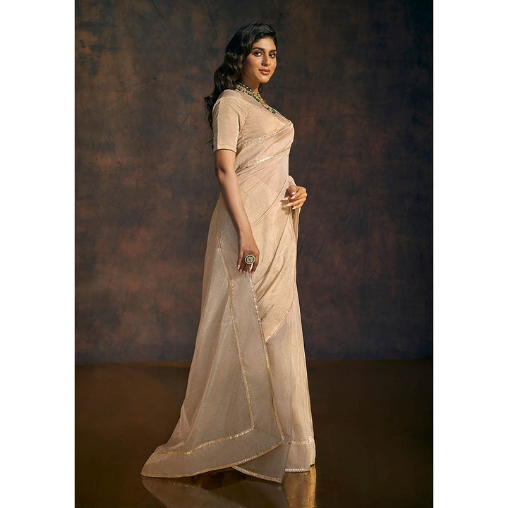 SALWAR STUDIO Beige Embellished Tissue Saree without Blouse