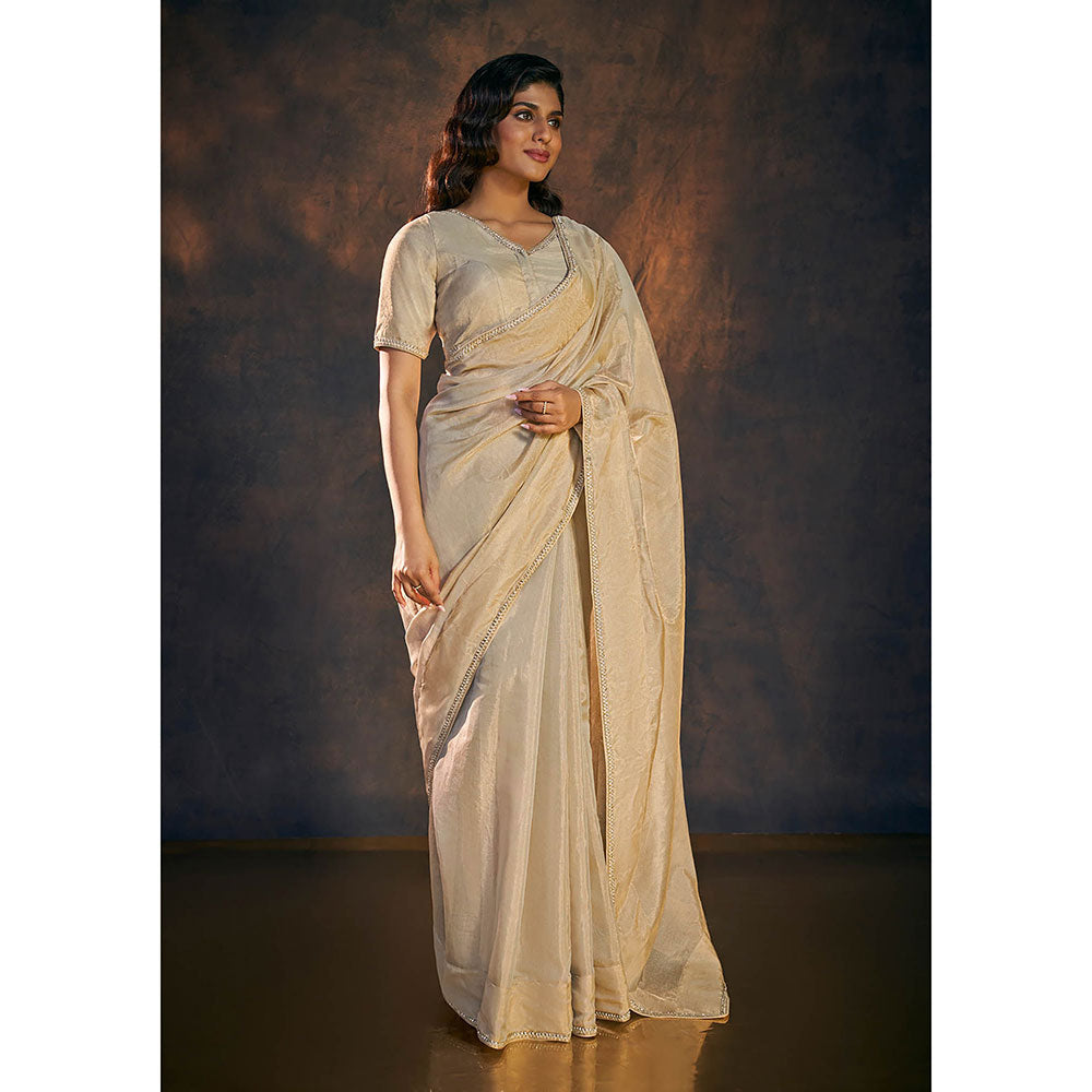 SALWAR STUDIO Beige Embellished Tissue Saree without Blouse