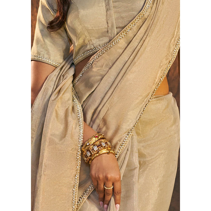 SALWAR STUDIO Beige Embellished Tissue Saree without Blouse