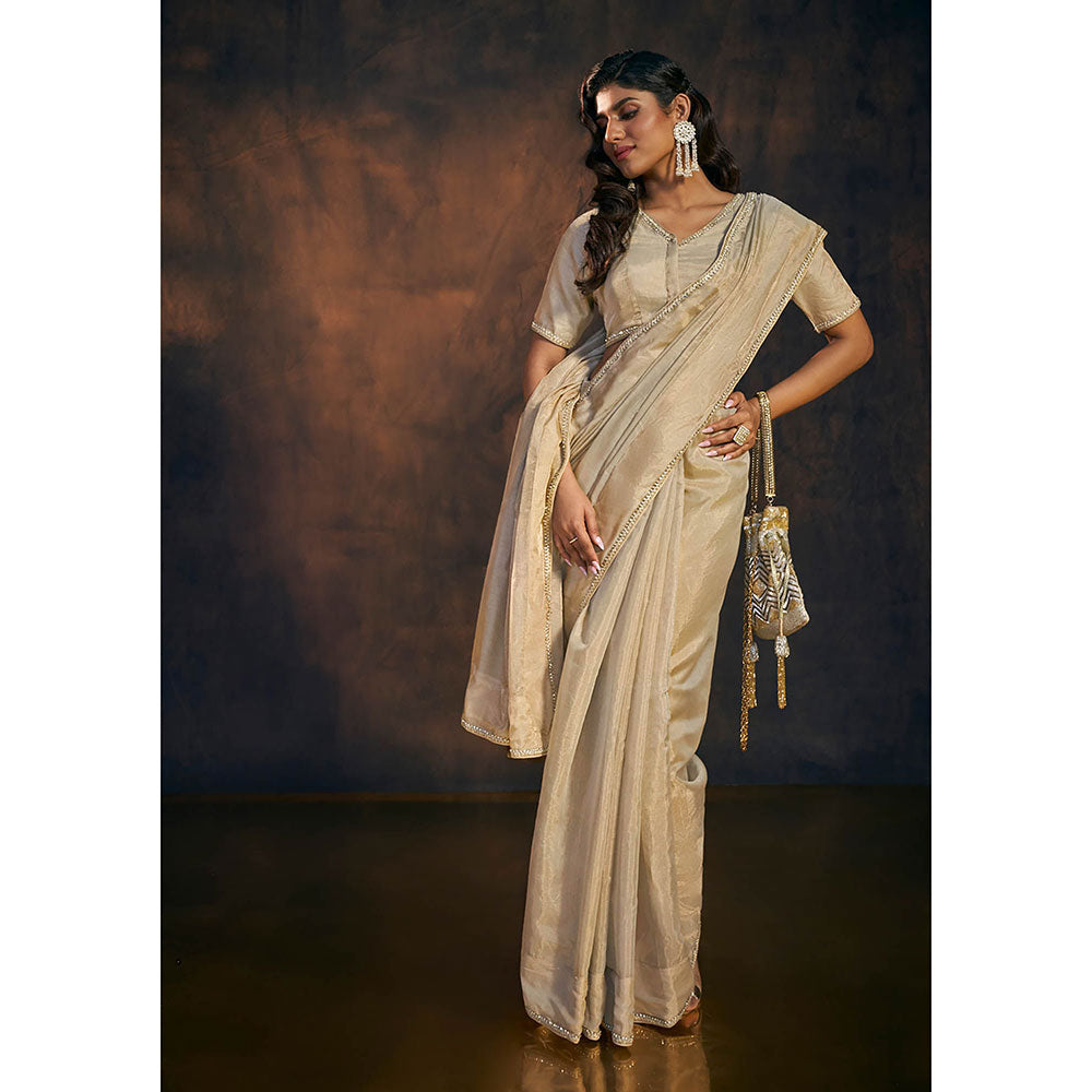 SALWAR STUDIO Beige Embellished Tissue Saree without Blouse