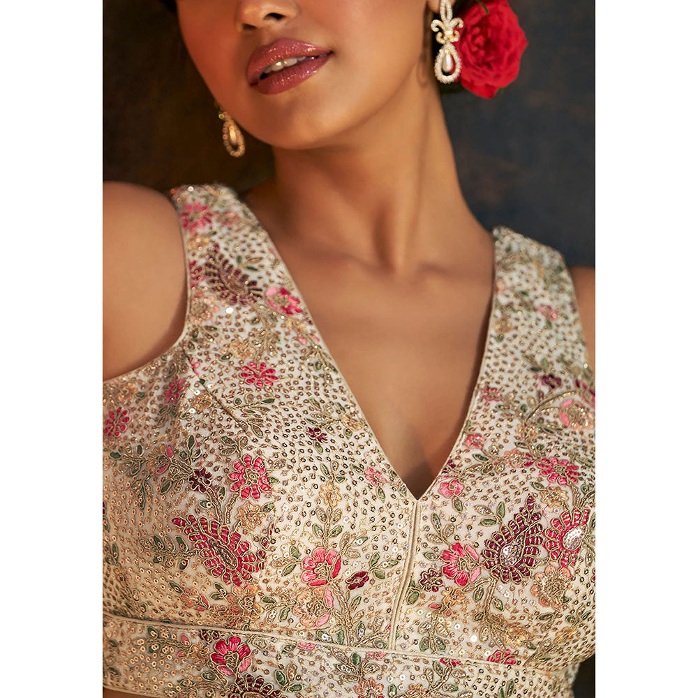 SALWAR STUDIO Cream Sleeveless Stitched Blouse with Floral Embroidery and Sequin