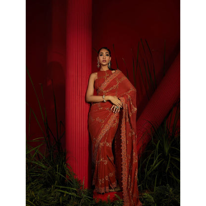 Shreeka Rust Saree In Georgette Silk Paired With Matching Stitched Blouse And Petticoat