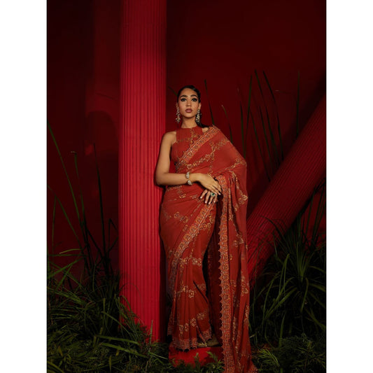 Shreeka Rust Saree In Georgette Silk Paired With Matching Stitched Blouse And Petticoat
