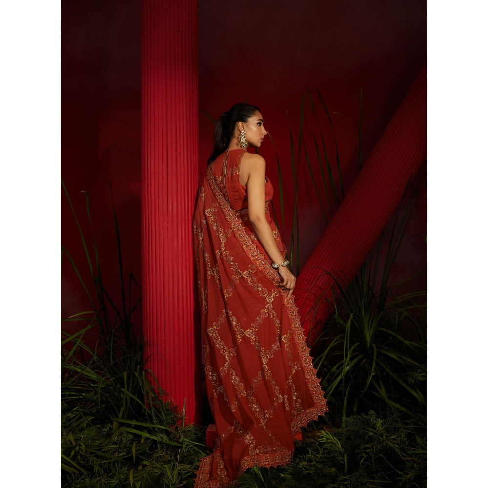 Shreeka Rust Saree In Georgette Silk Paired With Matching Stitched Blouse And Petticoat