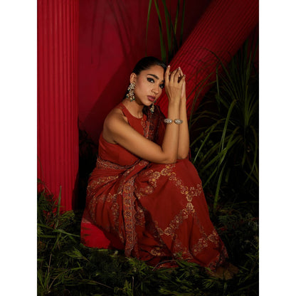 Shreeka Rust Saree In Georgette Silk Paired With Matching Stitched Blouse And Petticoat