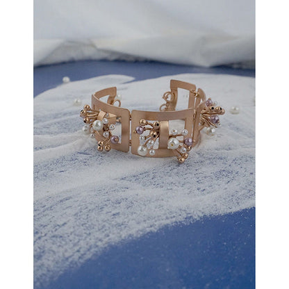 Suhani Pittie Rectangular Golden Bracelet with Pearls Worn By Samyukta Menon