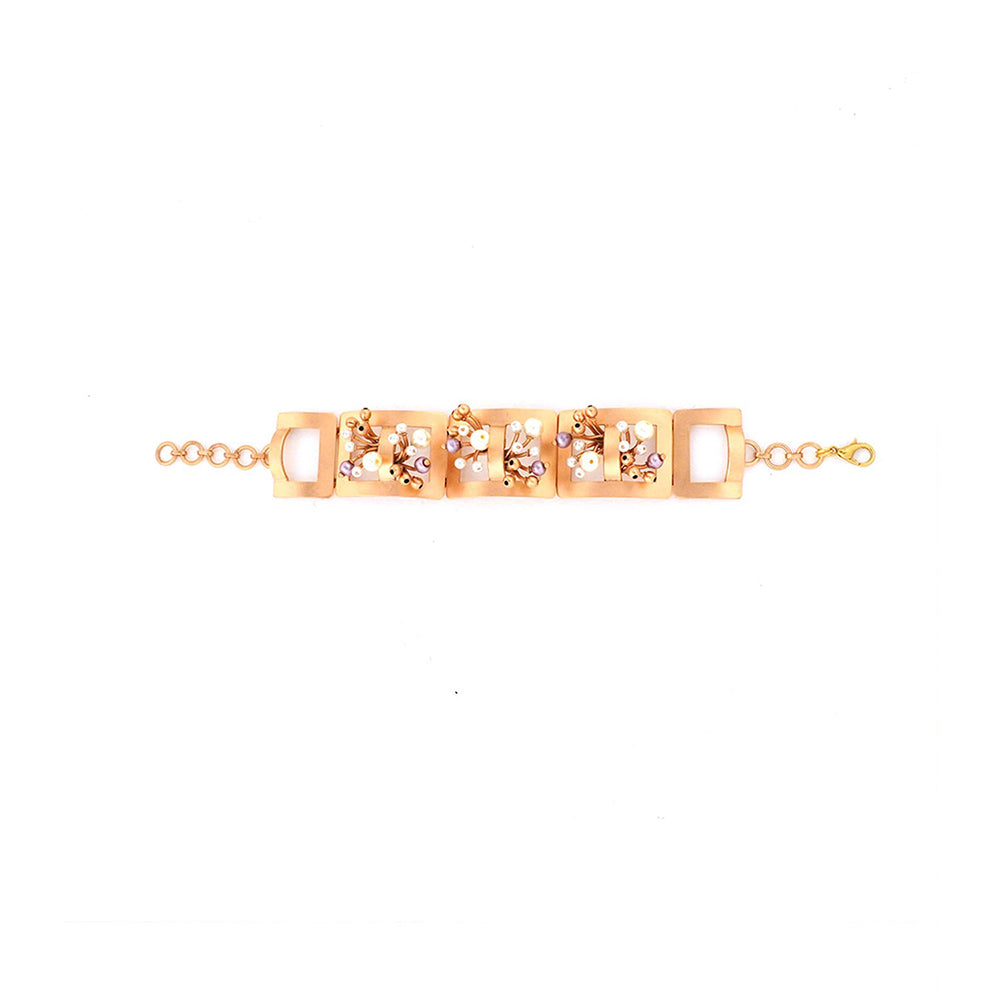 Suhani Pittie Rectangular Golden Bracelet with Pearls Worn By Samyukta Menon