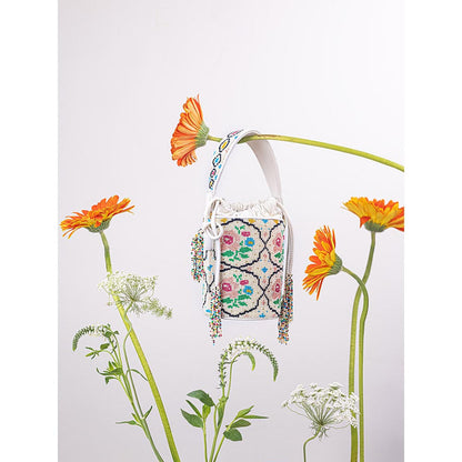 The Leather Garden Poppy Beaded Bucket Bag